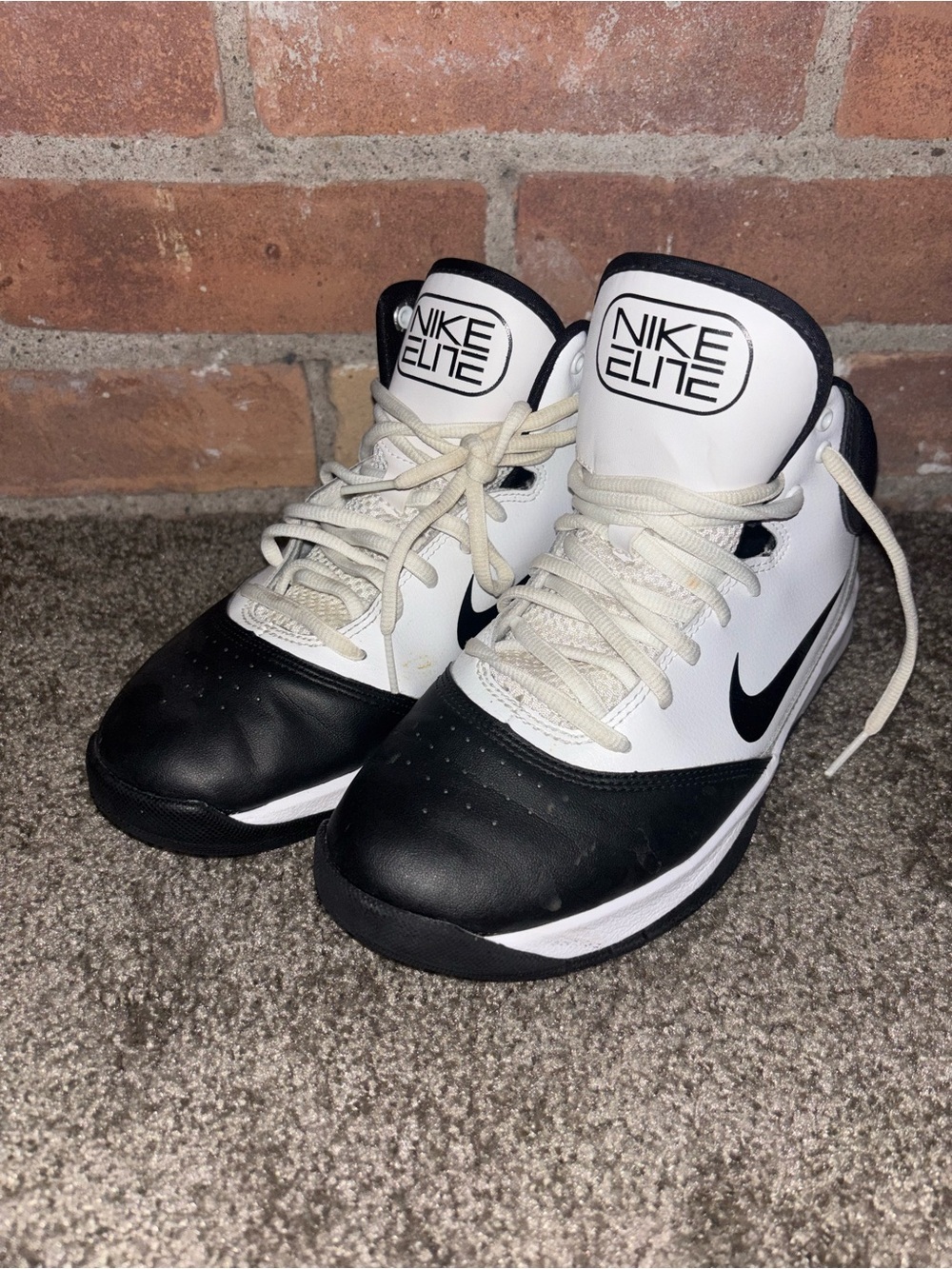 Kids Nike Elite Black and White Mid-Top Athletic Sneakers